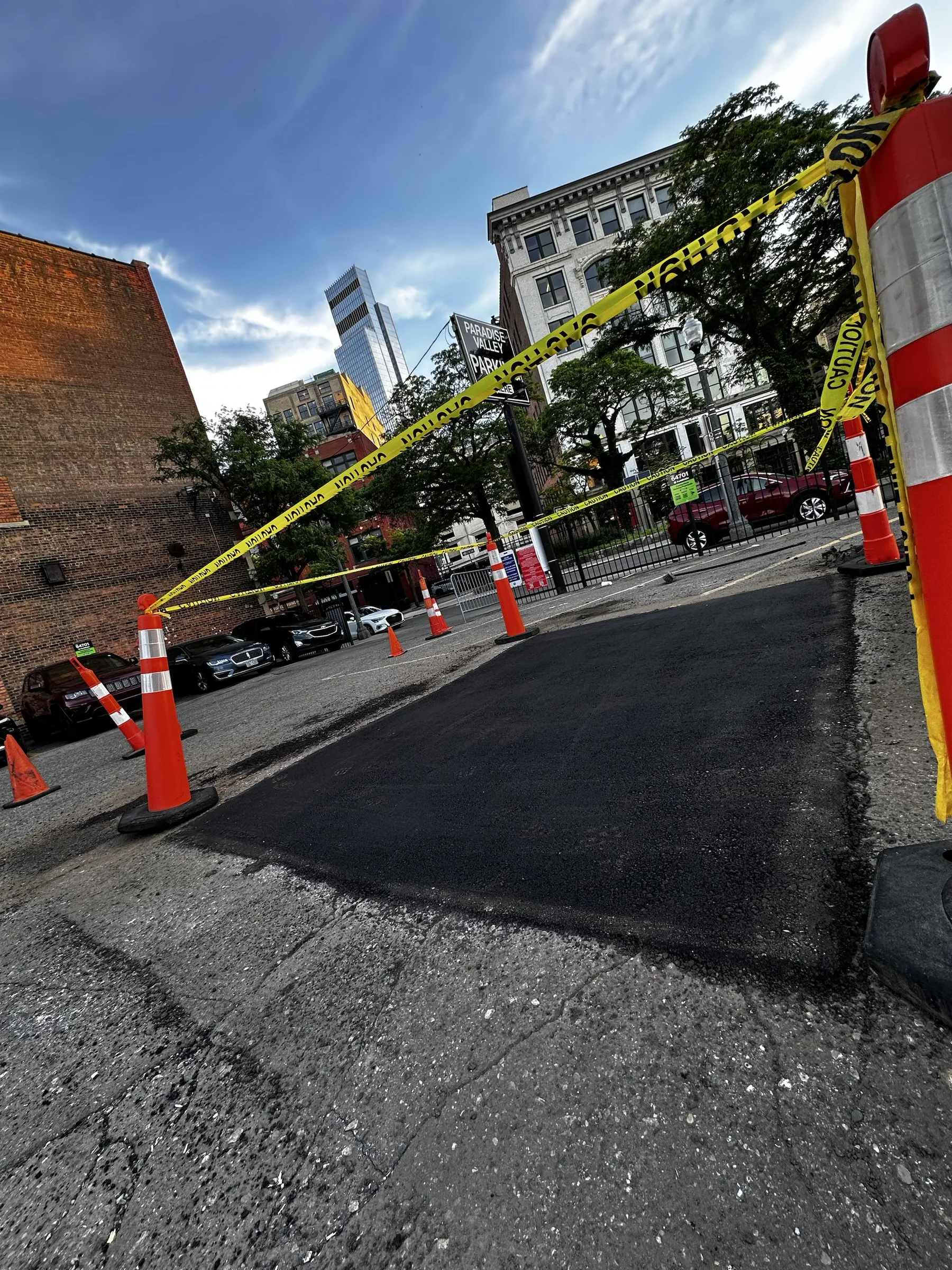Elite Asphalt crew completing an asphalt repair project